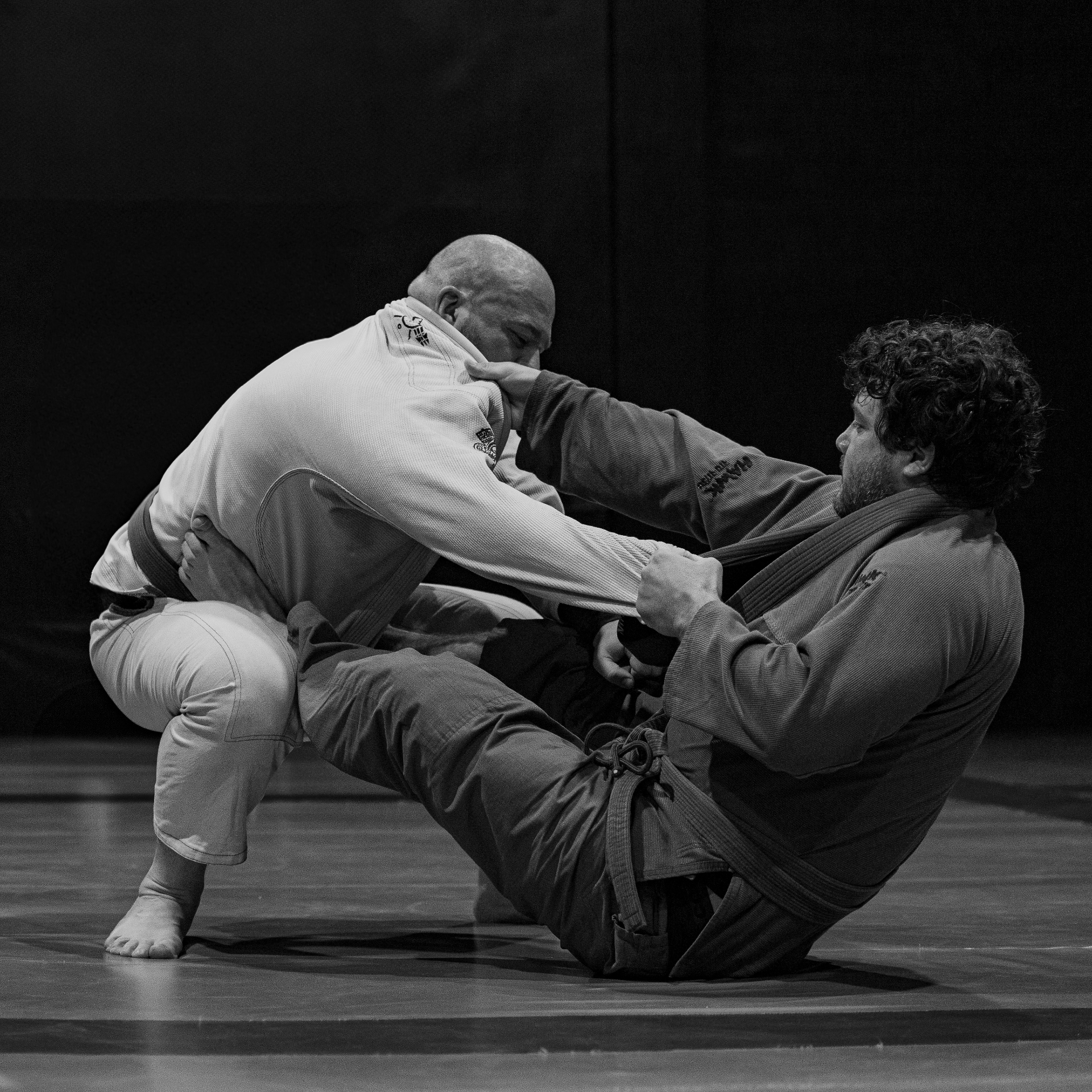 Coach demonstrating fundamentals at Fearless MMA